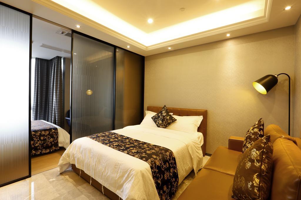 Boman Holiday Apartment Bei Jing Lu Jie Deng Du Hui Branch Canton Esterno foto