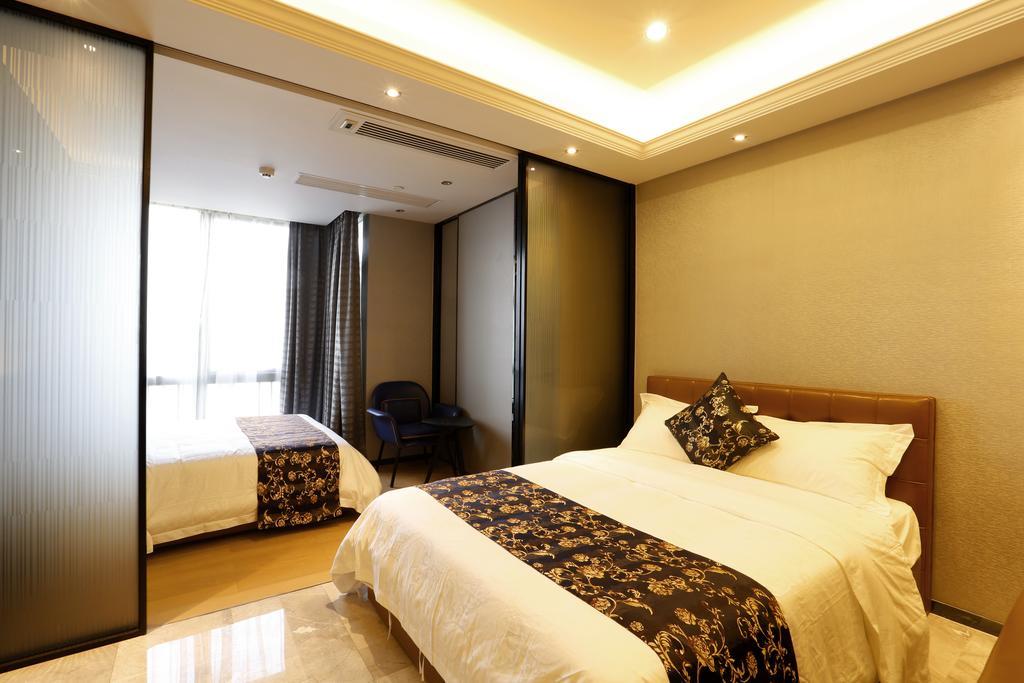 Boman Holiday Apartment Bei Jing Lu Jie Deng Du Hui Branch Canton Esterno foto