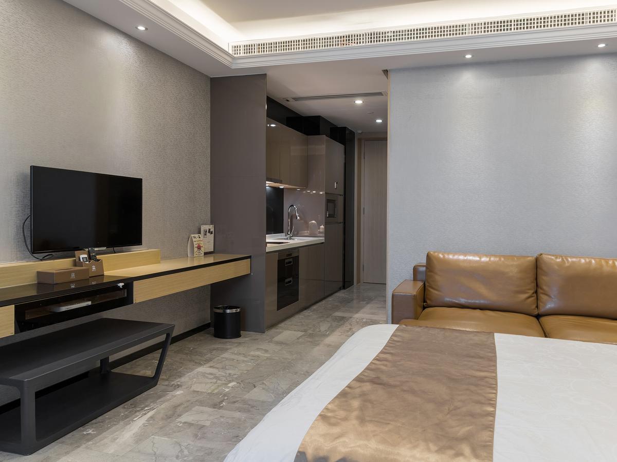 Boman Holiday Apartment Bei Jing Lu Jie Deng Du Hui Branch Canton Esterno foto